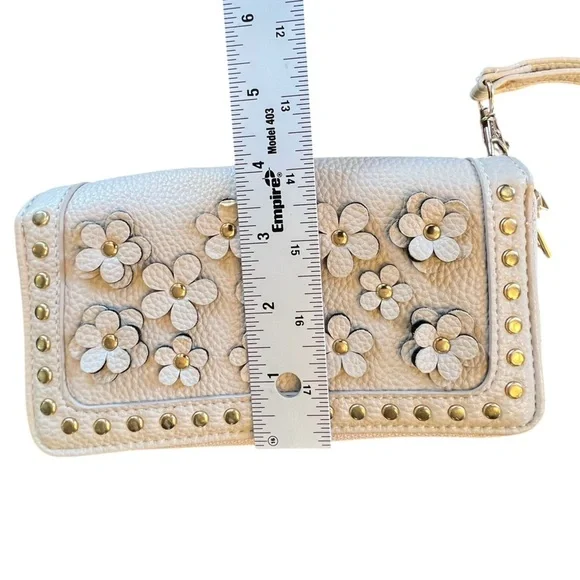 Under One Sky Wristlet Ivory with leather flower cut outs - Picture 11 of 11
